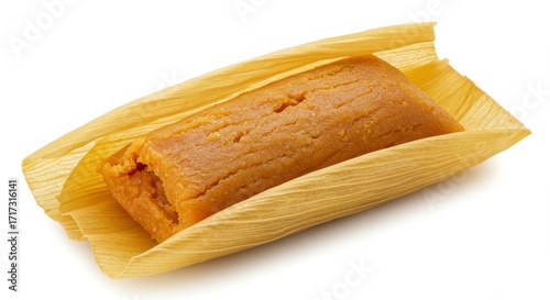 Isolated sweet tamale wrapped in corn husk on a white background for dessert or food photography or culinary use