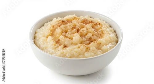 Bowl of arroz con dulce Puerto Rican spiced rice pudding isolated on a white background for food or dessert uses