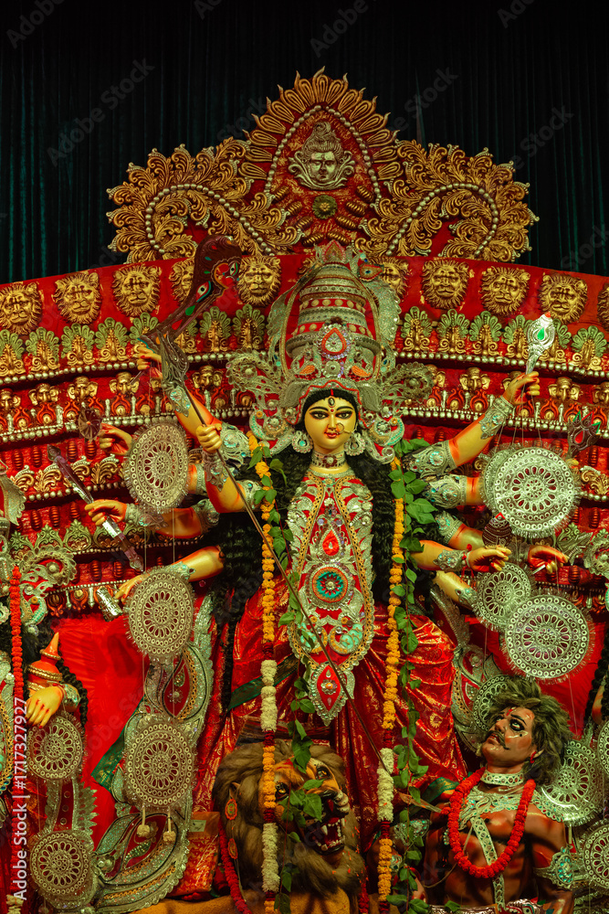 Fototapeta premium Shubho mahalaya, An handmade colourful idol of Goddess Durga decorated in Pandal during navratri festival. Durga Puja is biggest religious festival of hindus and for bengali.