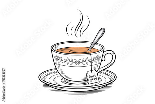 Steaming cup of tea with a spoon and tea bag on a saucer