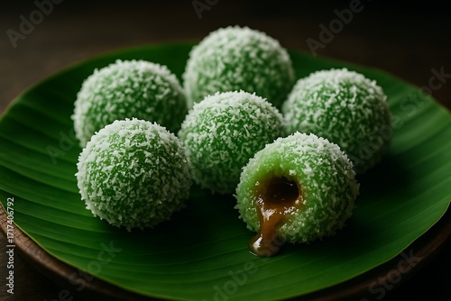 traditional klepon rice cake with coconut and palm sugar stock photo
