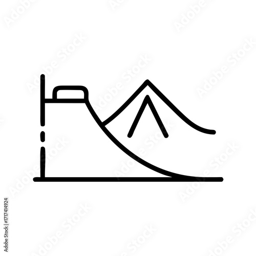 Snow park ramp with mountains in background for winter sports  