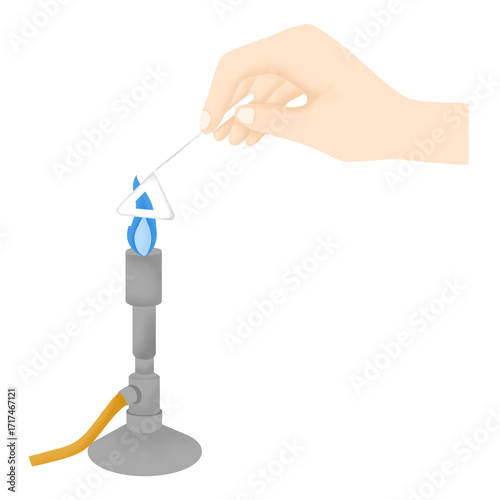 Bilde på lerret Hand holds spreader on flame for sterilization