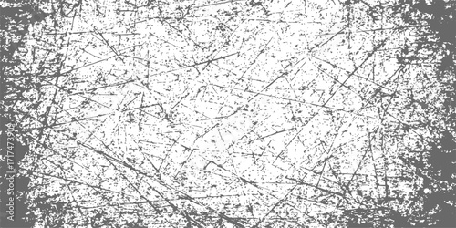 An abstract vintage grunge wall texture with a rough pattern of old black and white paper