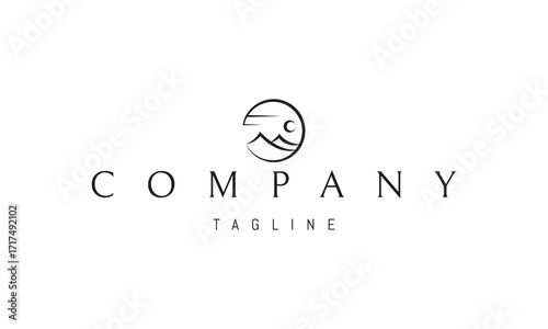 A vector logo featuring an abstract image two mountain peaks enclosed within a circle.