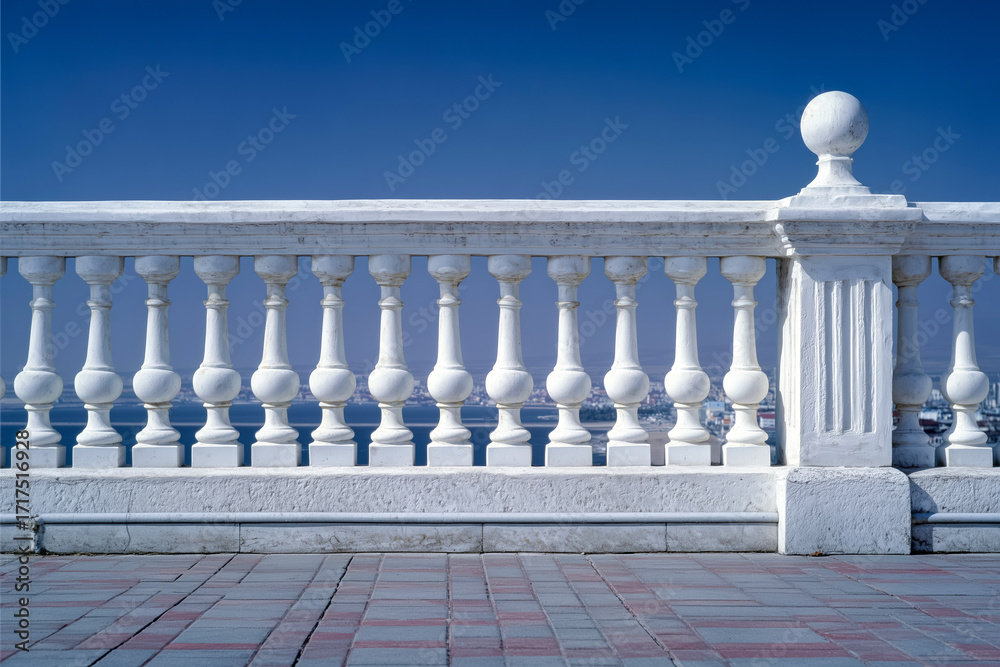 Fototapeta premium White stone balustrade with clear blue sky and paved walkway