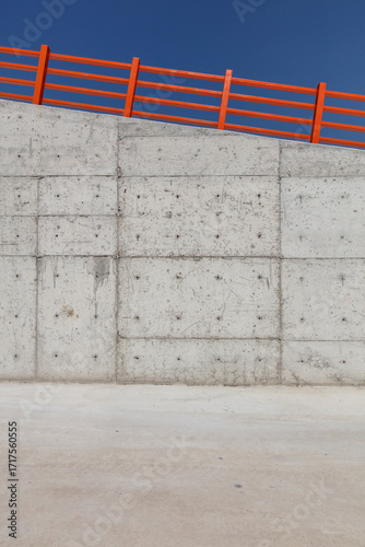 Minimalist Concrete Wall with Clear Blue Sky