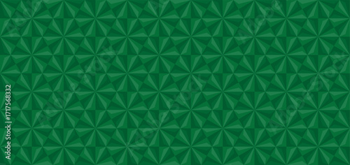 Green geometric seamless pattern background with abstract symmetry wallpaper design