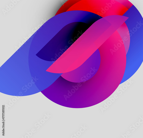 Abstract colorful shapes overlap, creating dynamic visual effect. Gradient hues blend smoothly, forming fluid composition. Modern design.