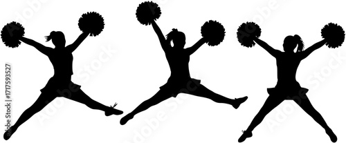 Silhouette of three cheerleaders jumping and holding