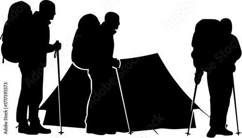 Silhouette of two hikers with backpacks and hiking poles 