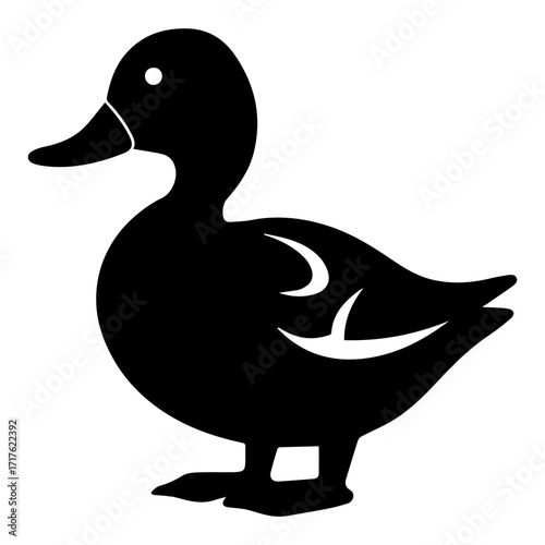 Isolated black silhouette of a duck with a white eye and wing details on a white background image