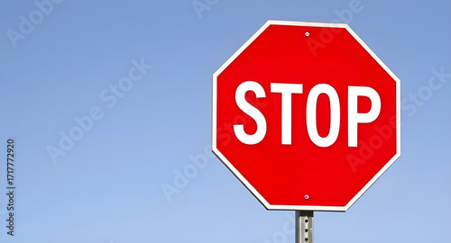 stop sign on blue sky