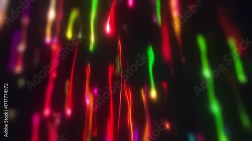 Abstract vibrant streaks of light in various colors against a black background