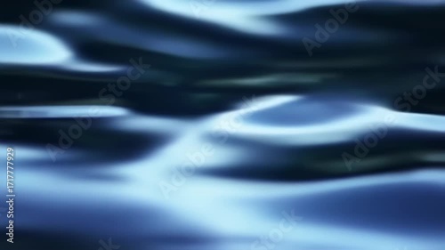 Abstract liquid motion in shades of blue