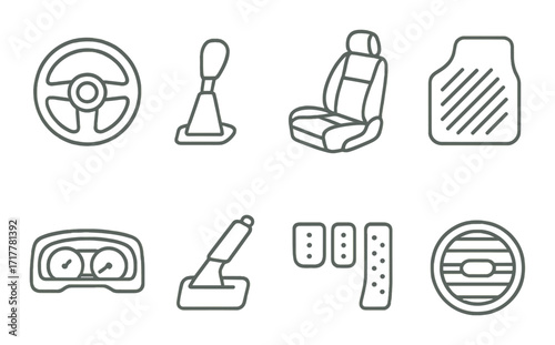 Outline of car accessories including steering wheel, gear shifter, and seat on gray background