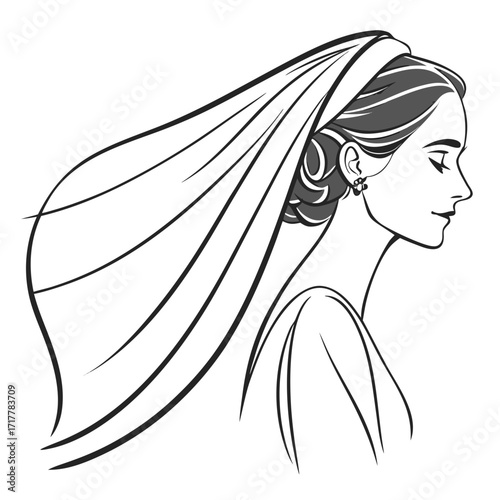 Elegant bride in profile wearing a flowing veil and elegant updo hairstyle with subtle jewelry