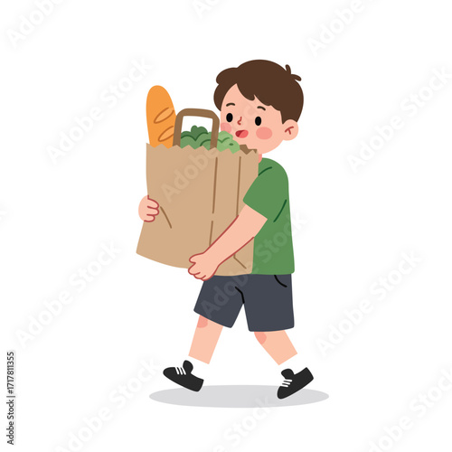a boy in a green t-shirt and shorts, walking carefully while carrying a paper grocery bag almost as big as him