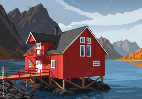 Charming red stilt house on a serene fjord with mountain peaks in an autumn landscape