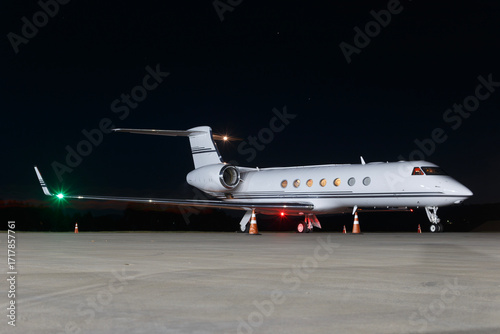 Gulfstream G550 photographed at night at Catarina Airport, Brazil, July 3, 2023. Illuminated private jet on the ramp.