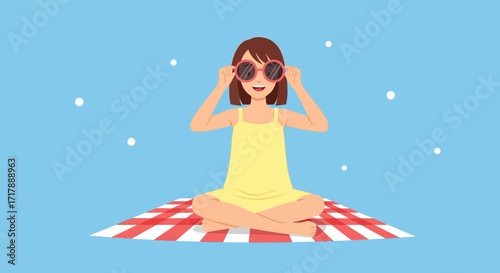 Joyful Young Girl with Shades Relaxing Outdoors on a Red and White Picnic Blanket