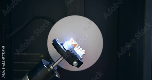 Professional dental machine carving out artificial teeth