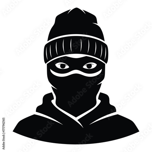 Mysterious figure wearing a beanie and face mask embodying anonymity and stealth silhouette