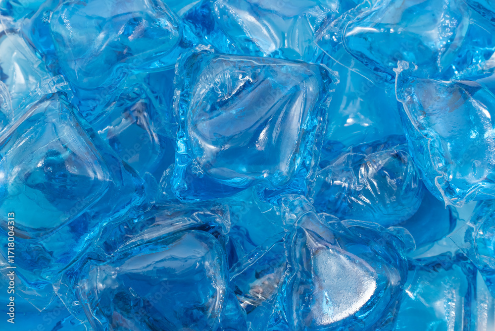 Obraz premium Lots of blue laundry detergent capsules. Washing machine capsule background.