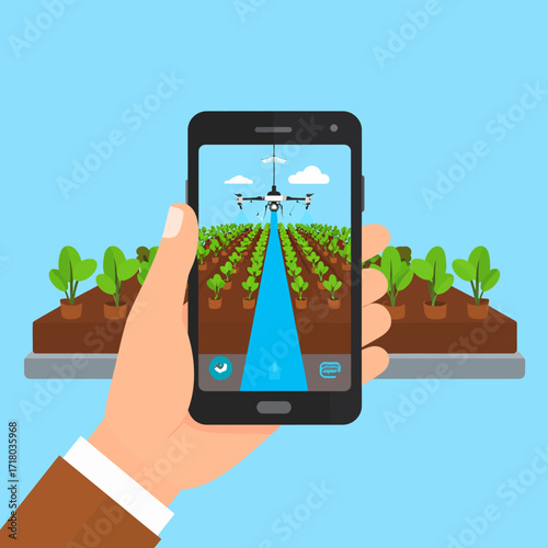 Smartphone controlling a drone surveying a modern agricultural field with smart technology