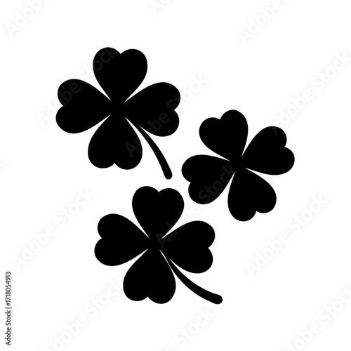 Three Four Leaf Clovers in a Minimalist Black and White Design