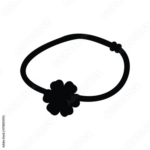 Black silhouette of a clover hair tie on a white background.
