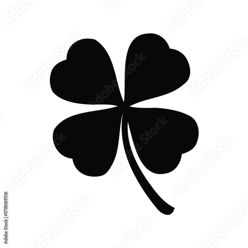 A solitary black four leaf clover for good luck and fortune