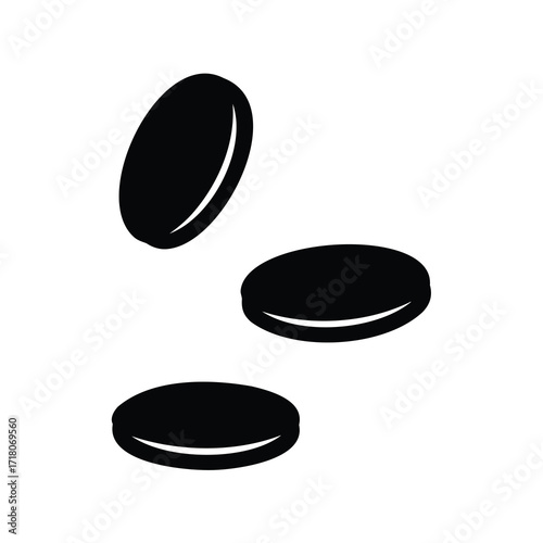 Three black discs falling in a simple illustration over a white background