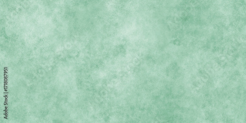 Abstract Elegant dark green background with mottled vintage texture in old fancy background design, texture of colored parchment paper.