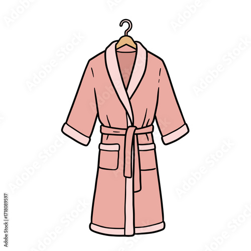 Pink bathrobe hanging on a hook with a soft texture and details  