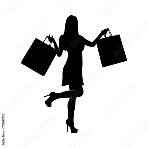 silhouette of woman with shopping bags