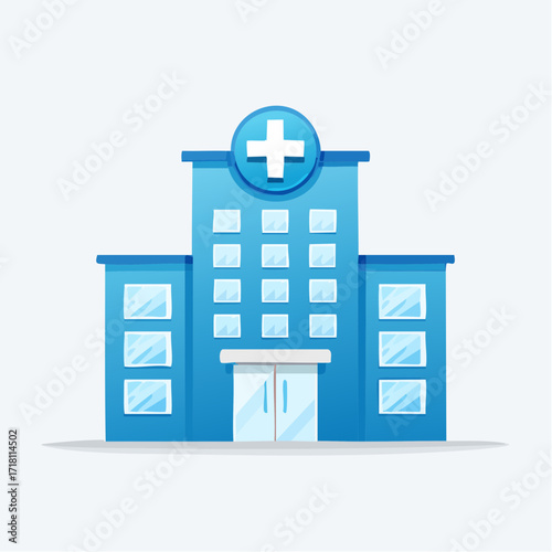 A modern blue hospital building with a prominent white cross symbol above the entrance, representing healthcare services.