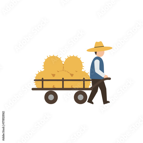 Farmer pushing a cart full of hay bales.