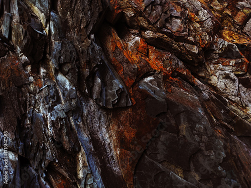 Autumn trend Burnt Wood. Burnt Wood color. Autumn style. Rock texture. Geodesy and geology. Burnt Wood tinted minerals.