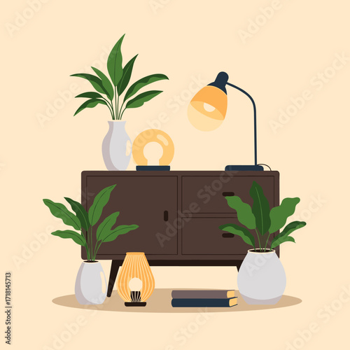 A collection of decorative plants and lighting fixtures adorns a wooden cabinet creating a warm ambiance.