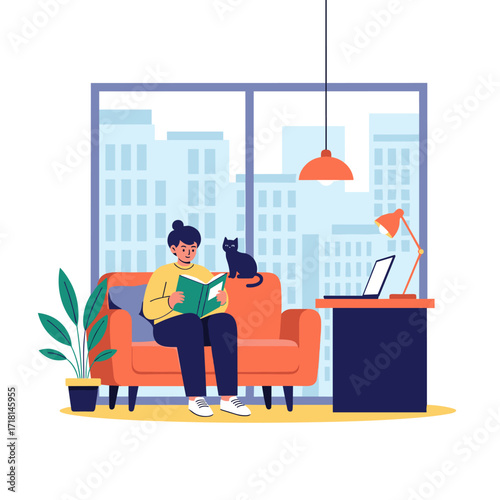 A person reading a book while sitting on a couch with a cat nearby in a well-lit room with a city view.