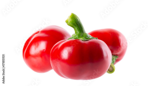 Sweet round peppers isolated on white background. Ripe round red paprika. Clipping path.