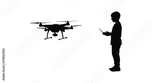 Silhouette of a boy operating a drone with remote control technology