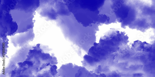 Wispy clouds float against a turquoise sky, creating a serene and tranquil moment in nature. Clouds in hues of navy and midnight blue. Bright blue smoke clouds hovering over calm water.