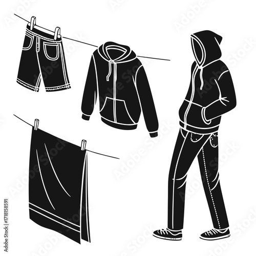 Person with clothes on a clothesline and hanging shorts
