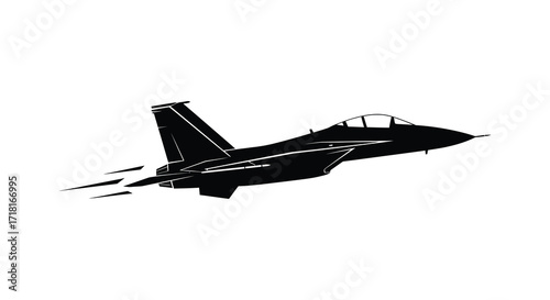 Silhouette of a military jet fighter aircraft in dynamic flight