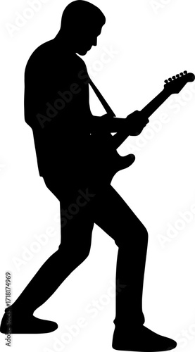 Guitarist standing and playing electric guitar, body angled slightly silhouette