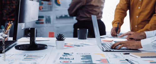 Canvas Print A consultant leverages technology by pairing with AI, gleaning valuable insights from research and analytics, fueling bold strategies for market expansion