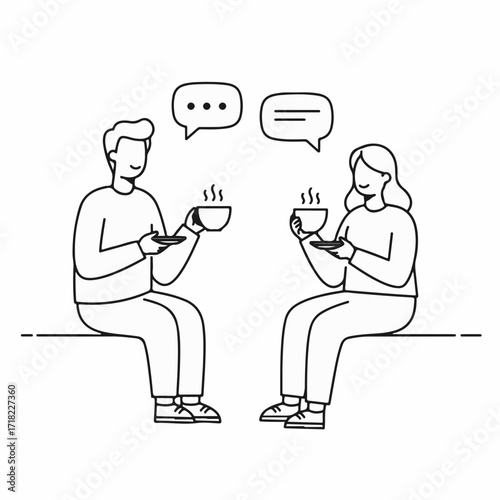 Two people enjoying a warm drink and conversation, representing connection and communication.
