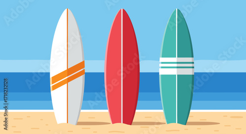 Three surfboards standing on a sandy beach with ocean background.